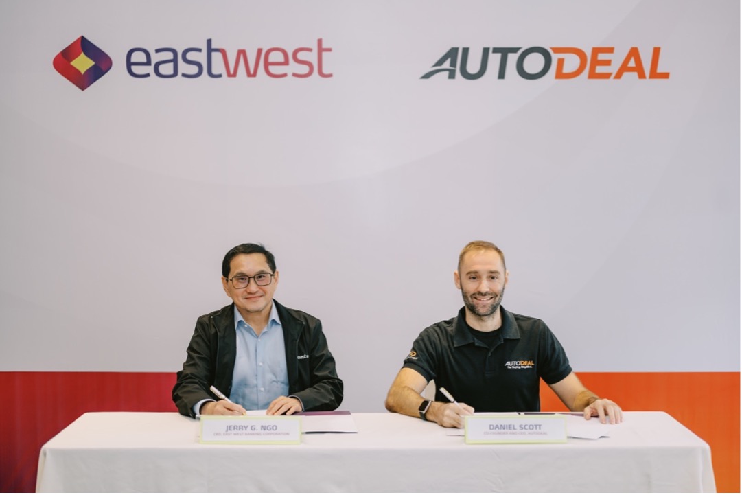 eastwest-auto-deal-signing